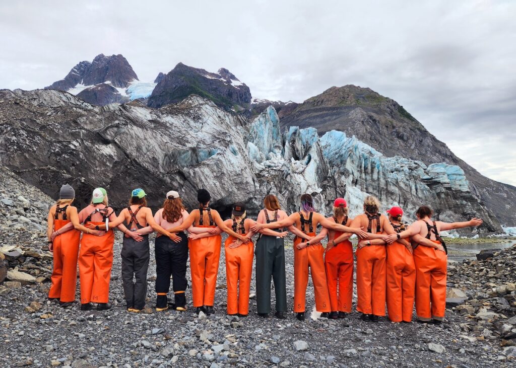 Explorer Chick women hiking near a glacier on a women's guided Alaska trip