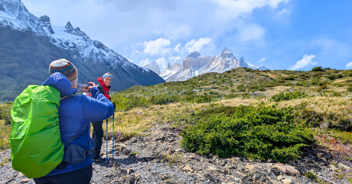 Women hiking beneath the Paine Massif in Torres del Paine National Park, Patagonia