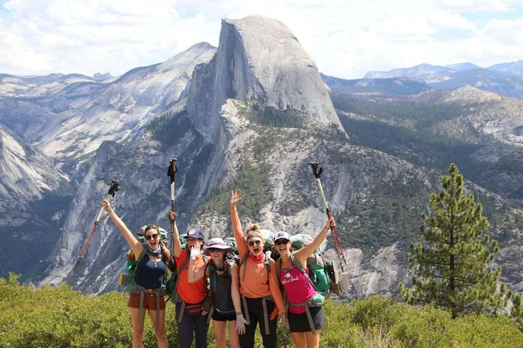 Explorer Chick women at Half Dome in Yosemite National Park