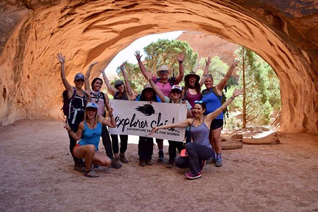 explorer chicks under an arch in nature