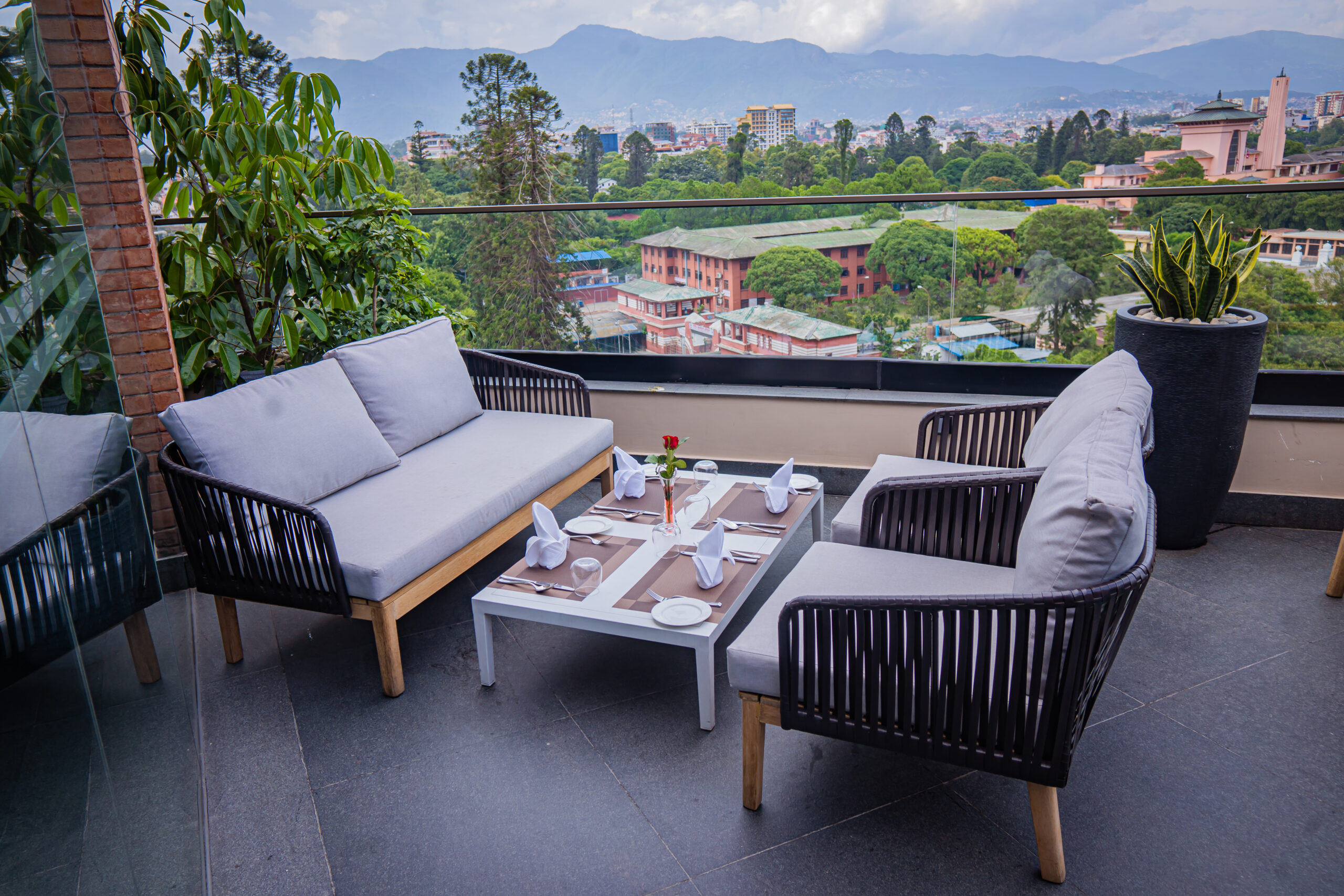 Terrace dining with Himalayan views at Barahi Kathmandu, Explorer Chick’s pre-trek hotel for the women’s Everest Base Camp Trek.